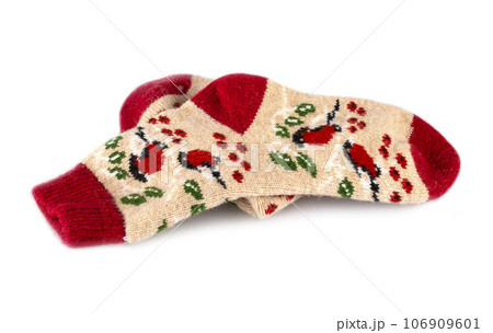 Traditional colored wool socks isolated on white Traditional colored wool socks isolated on white 106909601