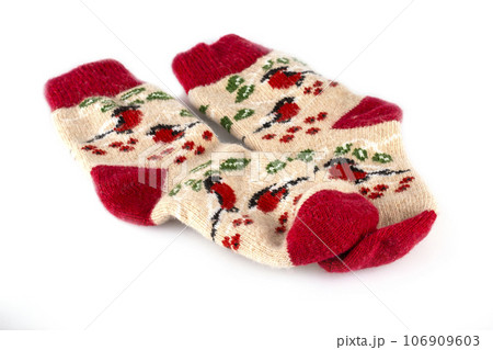 Traditional colored wool socks isolated on white Traditional colored wool socks isolated on white 106909603