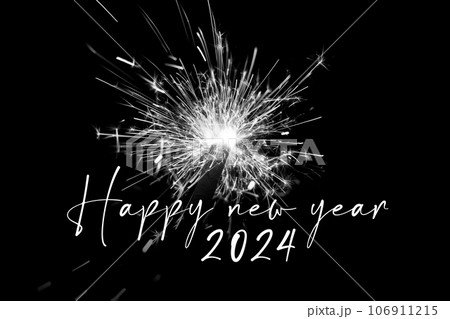 Happy new year 2024 black white sparkler years eve countdown. Luxury entertainment celebration turn of the year party time. Premium nightlife visual with glowing light sparks on dark background. 106911215