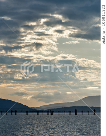 Golden sunset on Pacific ocean bay in Washington state 106911523