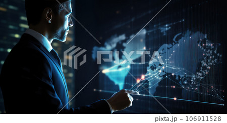 A businessman works with a huge holographic screen that displays current charts and stock quotes. Planning and strategy concept. A businessman works with a huge holographic screen that displays current charts and stock quotes. Planning and strategy concept. 106911528