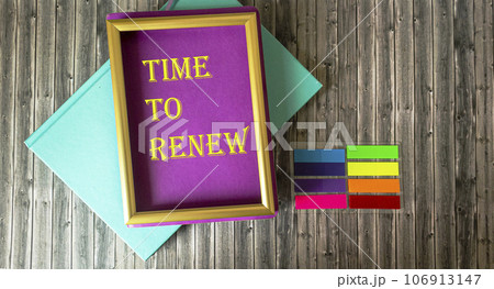 Time to renew and bright notepads and stickers on wooden table, business concept 106913147
