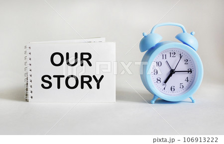 Our story, text written on notepad on white background, motivational concept for life and business 106913222