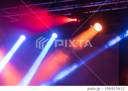 Colorful spotlights on the stage Colorful spotlights on the stage 106913612