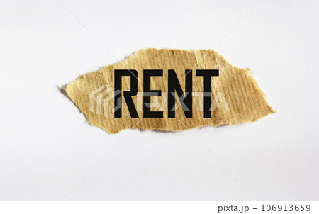 Rent increase symbol written on a scrap of paper and light background Rent increase symbol written on a scrap of paper and light background 106913659