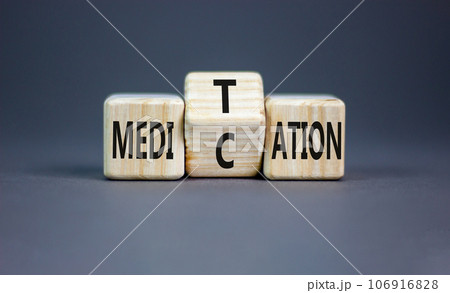 Meditation or medication symbol. Concept word Meditation medication on wooden block on a beautiful grey table grey background. Meditation or medication concept. Copy space. 106916828