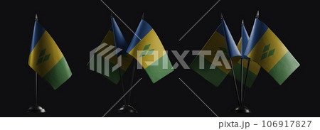 Small national flags of the Saint Vincent on a black background 106917827