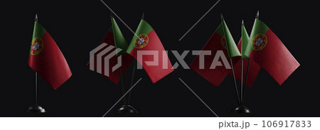 Small national flags of the Portugal on a black background Small national flags of the Portugal on a black background 106917833