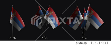 Small national flags of the Serbia on a black background 106917841