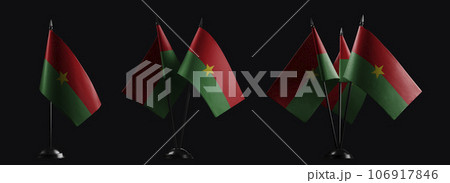 Small national flags of the Burkina Faso on a black background 106917846