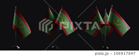 Small national flags of the Mauritania on a black background 106917847