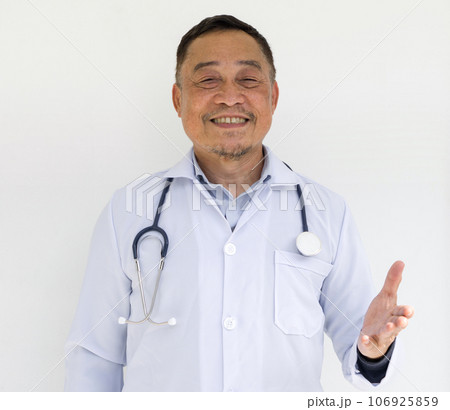 Asian senior man in professional attire, responsible look, donned in a white coat emblematic of the medical field have webcam conference with patient via wireless communication. 106925859