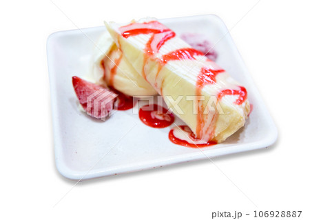 Top view of Slice of cheesecake layer on the white plate, focus selective 106928887
