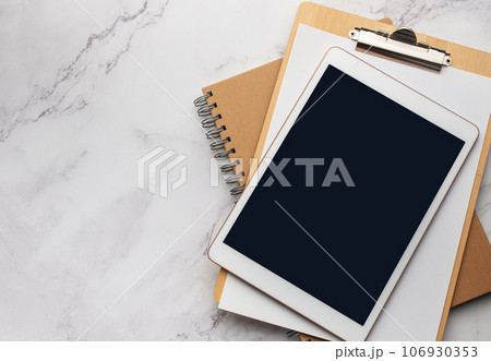 Tablet pc  and notebooks  on the office desk 106930353