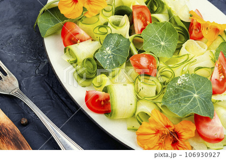 Tasty veggie salad with nasturtium Tasty veggie salad with nasturtium 106930927