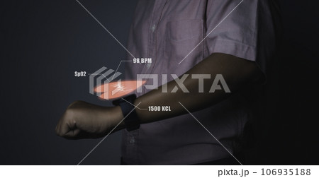 Man using smart watch technology checking heart rate. Man using smart watch technology checking heart rate. 106935188