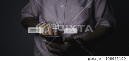 Man using smartphone typing Live chat chatting and social network. Man using smartphone typing Live chat chatting and social network. 106935190
