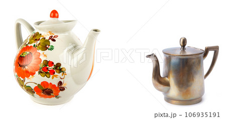 Porcelain and metal vintage teapots isolated on white background. Wide photo. Free space for text. Collage. Porcelain and metal vintage teapots isolated on white background. Wide photo. Free space for text. Collage. 106935191