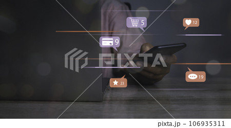 Man using social media shopping online marketing with notification icons. Man using social media shopping online marketing with notification icons. 106935311