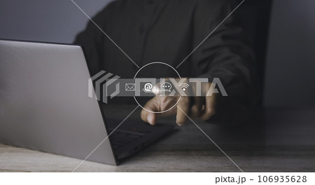 Man access contact connect online by laptop computer with contact icons. 106935628