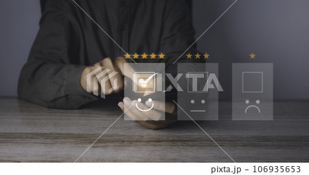 Businessman giving high score with five golden stars rating satisfaction in service. 106935653