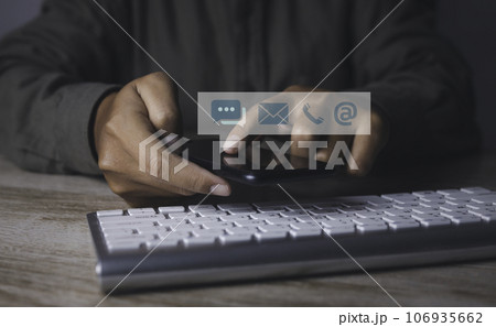 Businessman access contact connect online by smartphone with contact icons. Businessman access contact connect online by smartphone with contact icons. 106935662
