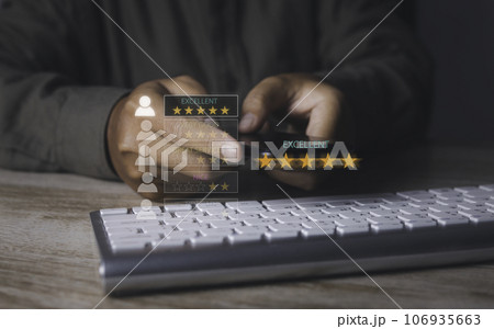 Businessman giving high score with five golden stars rating satisfaction in service. Businessman giving high score with five golden stars rating satisfaction in service. 106935663