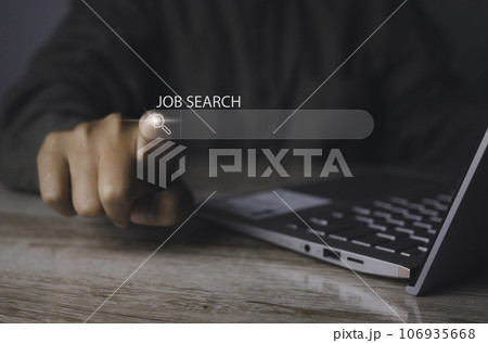 Man browsing work opportunities online by laptop computer. Job search. 106935668
