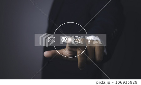 Man touching contact access connect online with virtual screen contact icons. Man touching contact access connect online with virtual screen contact icons. 106935929
