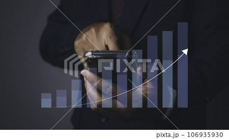 Stock market graph with man using phone financial profit stock development. 106935930