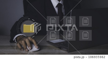 Businessman access business connection online documentation database and process automation to efficiently manage files. Businessman access business connection online documentation database and process automation to efficiently manage files. 106935982