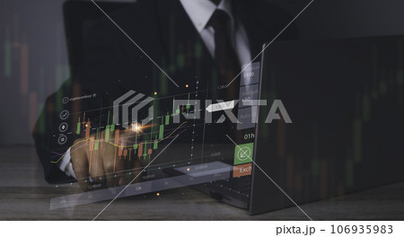 Stock market graph with man working stock trading computer screen background. Stock market graph with man working stock trading computer screen background. 106935983