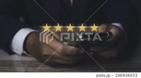 Businessman giving high score five golden stars rating satisfaction in service. Businessman giving high score five golden stars rating satisfaction in service. 106936033
