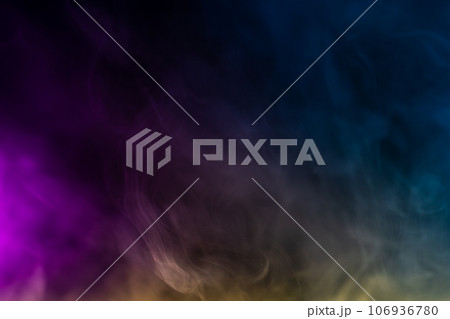 Blurred photo texture of colored smoke on a black background. Blurred photo texture of colored smoke on a black background. 106936780