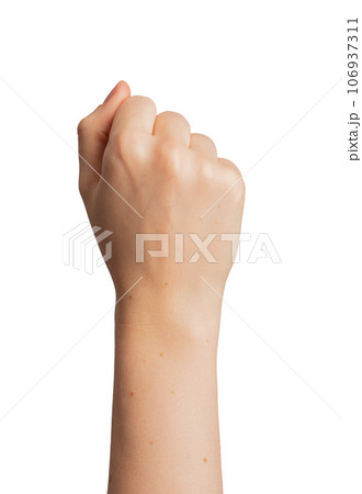 Female hand raised up, women power concept, isolated on white 106937311