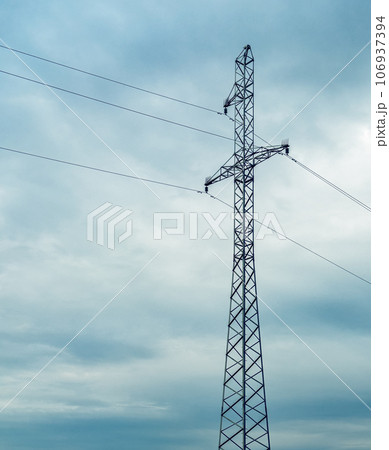 Electric power tower with transmitting cables over sky 106937394