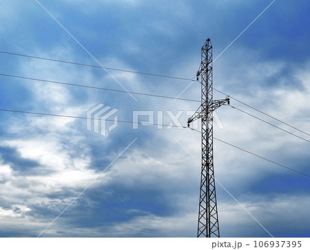 Electric power tower, mast with cables over clouded sky background 106937395