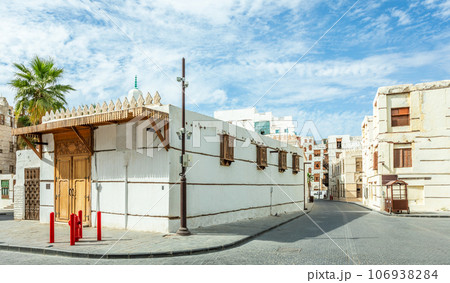Al-Balad old town streets and traditional muslim houses with wooden windows and balconies, Jeddah, Saudi Arabia Al-Balad old town streets and traditional muslim houses with wooden windows and balconies, Jeddah, Saudi Arabia 106938284