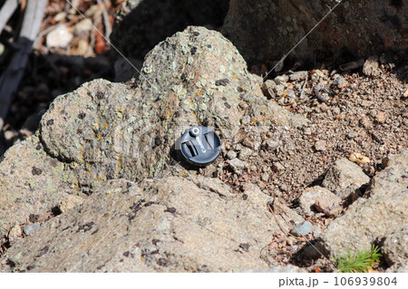 Canon Lens cap lost on the side of mountain Canon Lens cap lost on the side of mountain 106939804