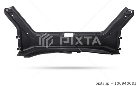 Sheathing of a car body part - trunk made of black plastic on a white isolated background in a photo studio for replacement or sale in a workshop. Sheathing of a car body part - trunk made of black plastic on a white isolated background in a photo studio for replacement or sale in a workshop. 106940083