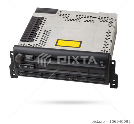 an audio system and a radio in gray and black plastic of car with cd and mp3 music on white isolated background 106940093