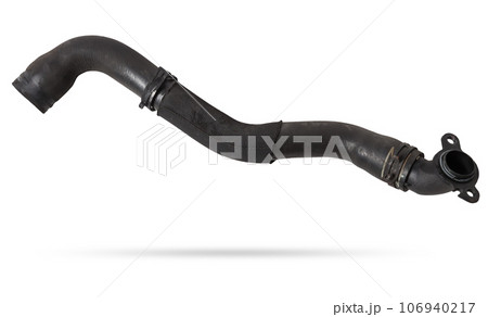 Black rubber hose of the car engine cooling system on a white isolated background in a photo studio for replacement during repair or for a catalog of spare parts for sale on auto disassembly. 106940217