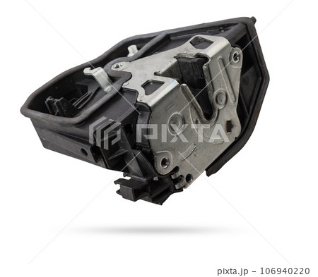Detail of a car spare part made of black plastic and metal - door lock separately isolated on a white background. Repair in a car workshop, equipment for sale. Detail of a car spare part made of black plastic and metal - door lock separately isolated on a white background. Repair in a car workshop, equipment for sale. 106940220