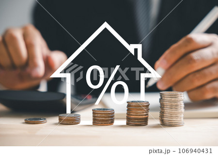 An ascending arrow on a graph points to the buoyant real estate market. A house model and coin stack beside it depict inflation, economic growth, and insurance service costs. Property value is rising. 106940431