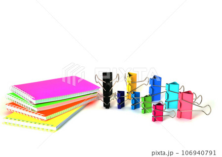 Colorful notepads clip for paper on a white background in the correct geometry 106940791