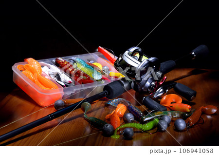 Fishing rod on a brown background 106941058
