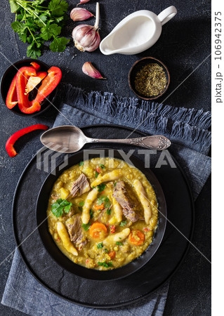 gungo peas soup with dumplings, veggies and beef gungo peas soup with dumplings, veggies and beef 106942375