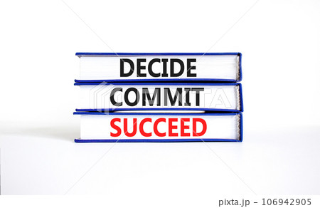 Decide commit succeed symbol. Concept word Decide Commit Succeed on beautiful books. Beautiful white table white background. Business decide commit succeed concept. Copy space. 106942905
