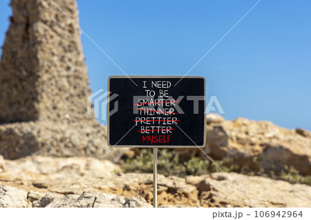 Be myself symbol. Concept words I need to be myself, not smarter, thinner, prettier, better on black chalk blackboard on a beautiful stone background. Psychological, be myself concept. Copy space. Be myself symbol. Concept words I need to be myself, not smarter, thinner, prettier, better on black chalk blackboard on a beautiful stone background. Psychological, be myself concept. Copy space. 106942964