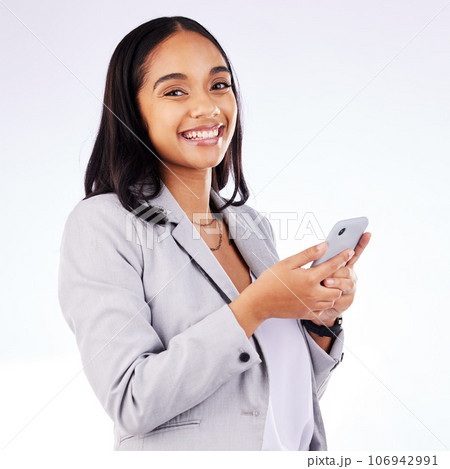 Business woman, portrait and smartphone typing in studio for social network, mobile website and internet contact. Happy female worker, cellphone and app user download online media on white background Business woman, portrait and smartphone typing in studio for social network, mobile website and internet contact. Happy female worker, cellphone and app user download online media on white background 106942991